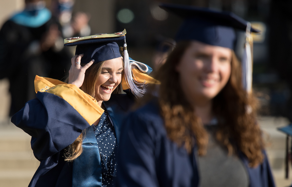 Undergraduate students participate in a commencement ceremony Saturday, Nov. 21, 2020 on Chamberlain Field.