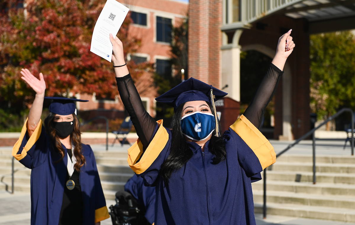 Undergraduate students participate in a commencement ceremony Saturday, Nov. 21, 2020 on Chamberlain Field.