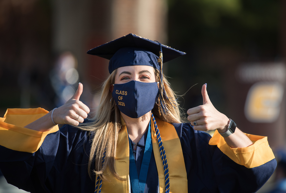 Undergraduate students participate in a commencement ceremony Friday, Nov. 20, 2020 on Chamberlain Field.