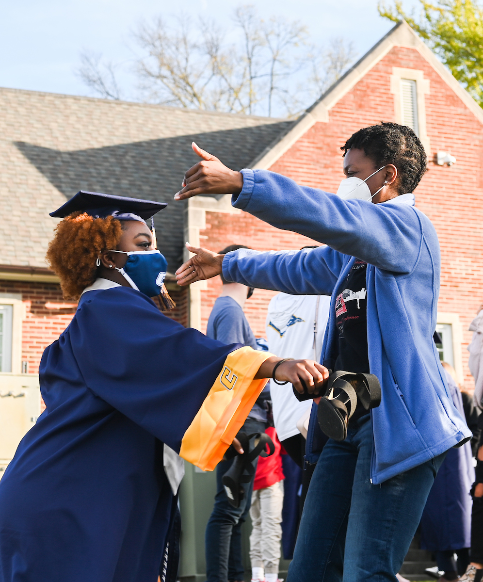 Undergraduate students participate in a commencement ceremony Friday, Nov. 20, 2020 on Chamberlain Field.