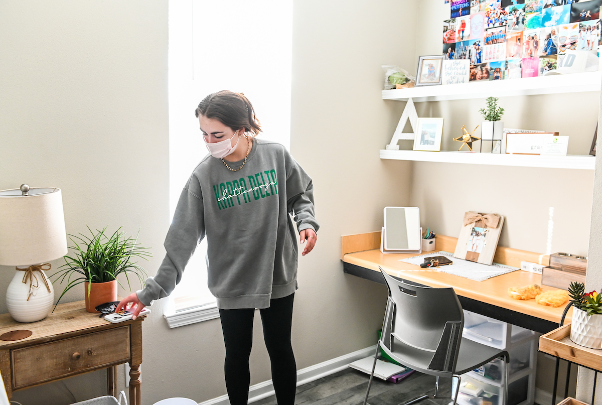 Ashleigh Carroll moves back into her room in Decosimo Apartments.