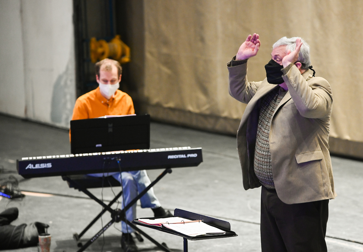 Ethan McGrath on piano and Kevin Ford, director of the singing ensembles at UTC, conducting.
