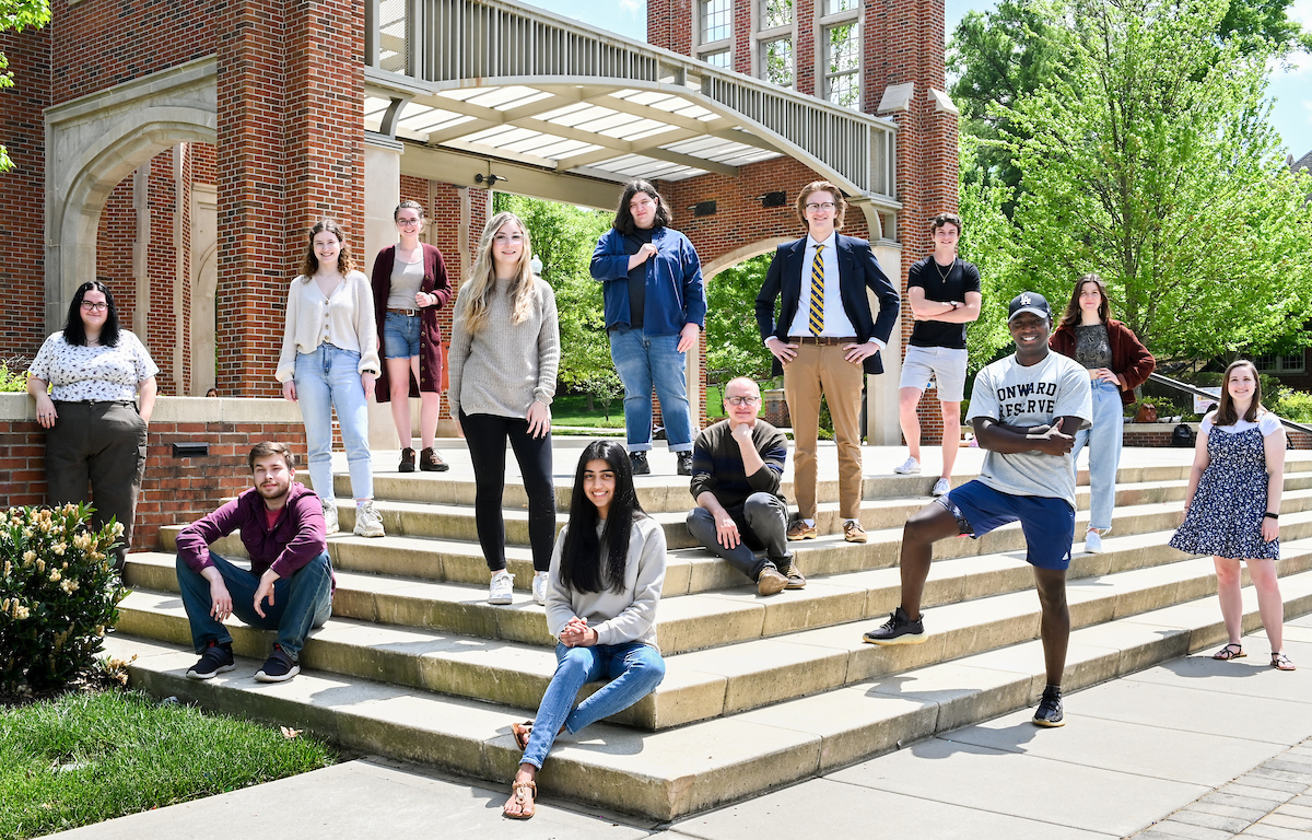 Podcast class, Tuesday, April 20, 2021 on Chamberlain Field. Podcast Class-21-471.jpg (left to right) Marcella Rea, Gabriel Pell, Allison Mccollum, Sarah Simmons, Kassidy Robertson, Shriya Purohit, Jude Keef, Will Davis, Colin Thompson, Evan Britt, Gavin Collins, Mazze Stokes, and Jessica Cline.