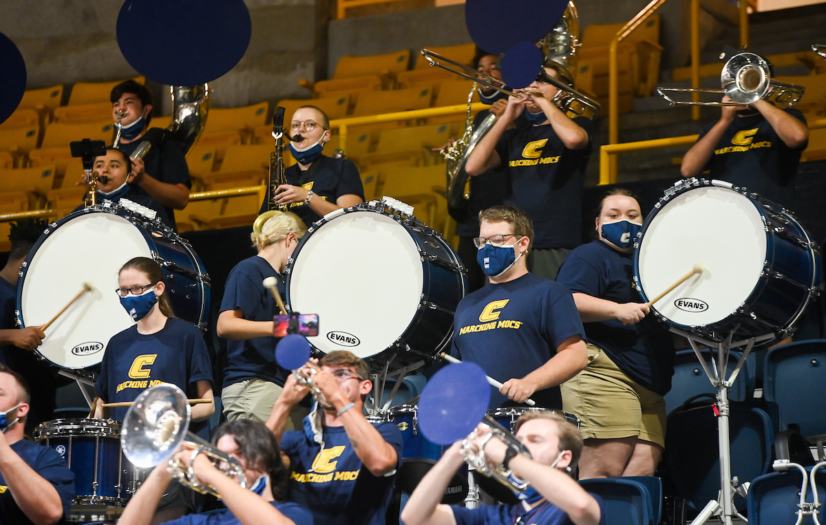 Marching Mocs perform in the stands at the McKenzie Arena.
