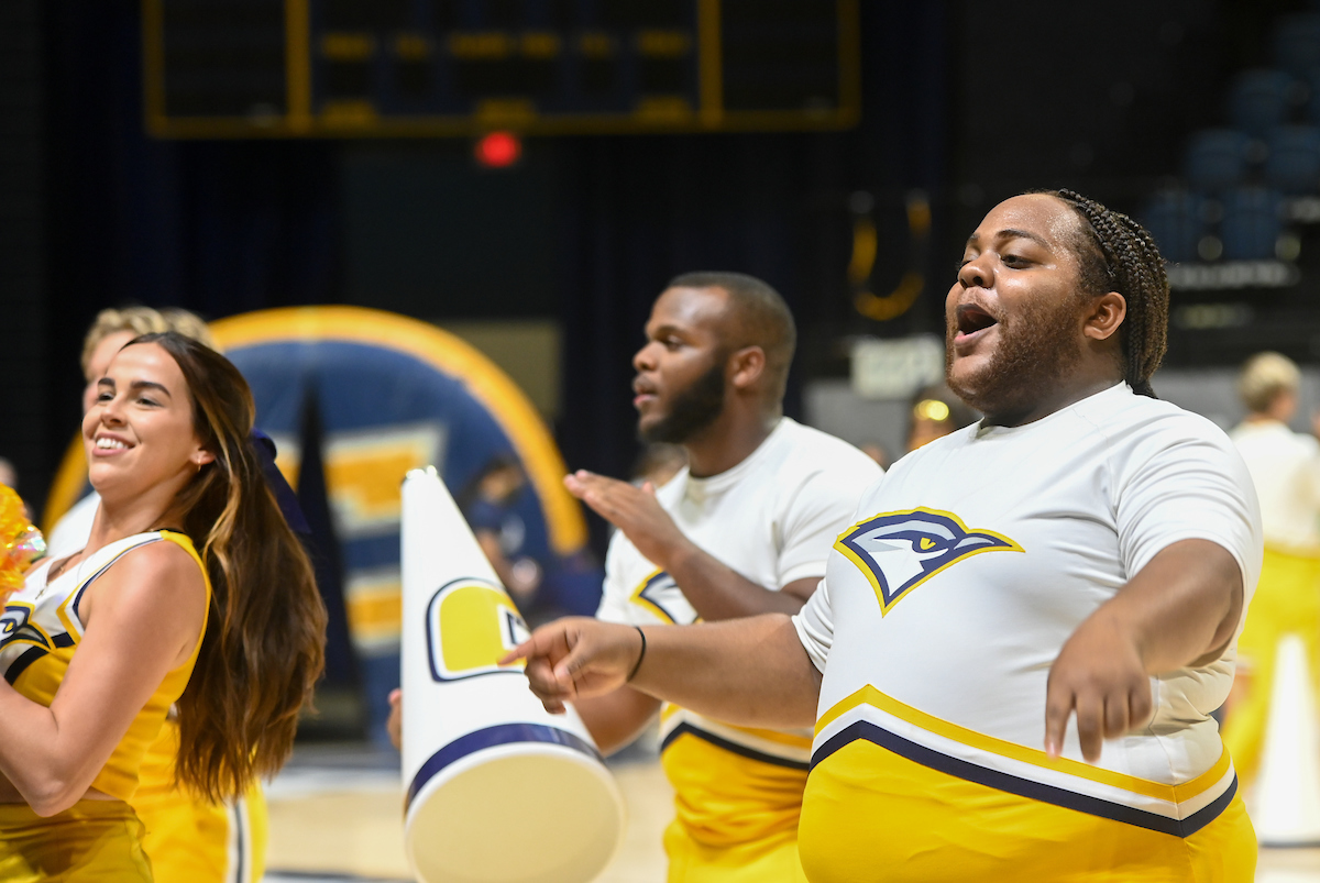 Cheerleaders perform on the McKenzie Arena floor.