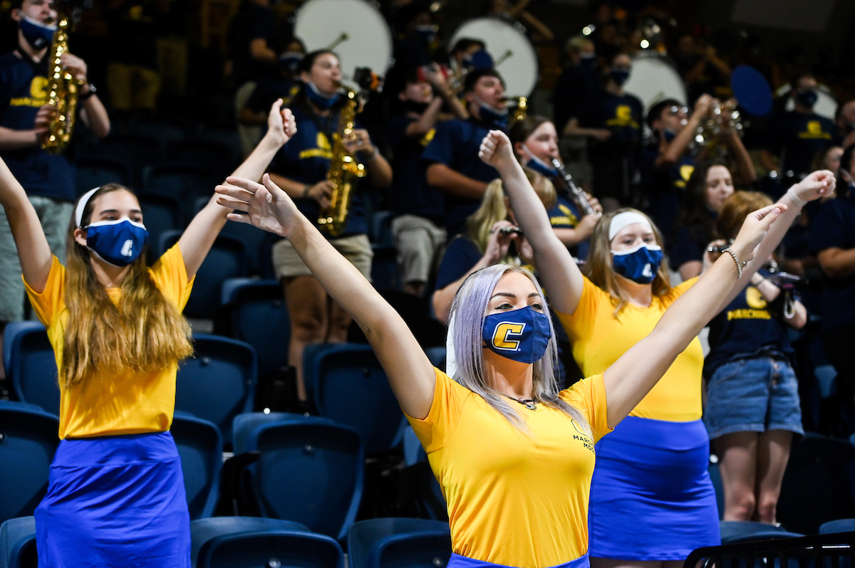 Marching Mocs perform in the stands at the McKenzie Arena.