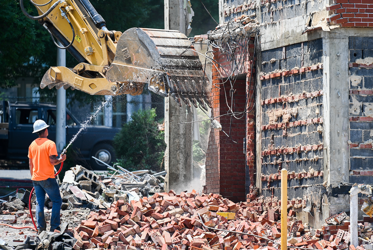 Crews work in July to demolish the 71-year-old Frist Hall. The building was removed with a green space temporarily left in its place.