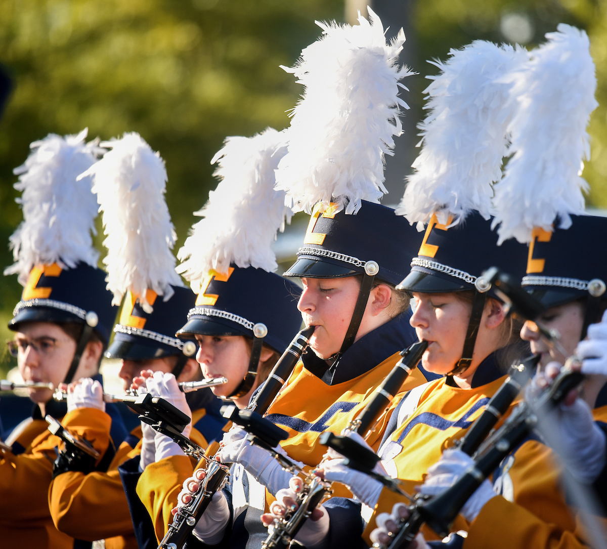 The Marching Mocs play for the tailgaters before the season's first football game. Randall Coleman was hired this year as band director and has increased membership in it.