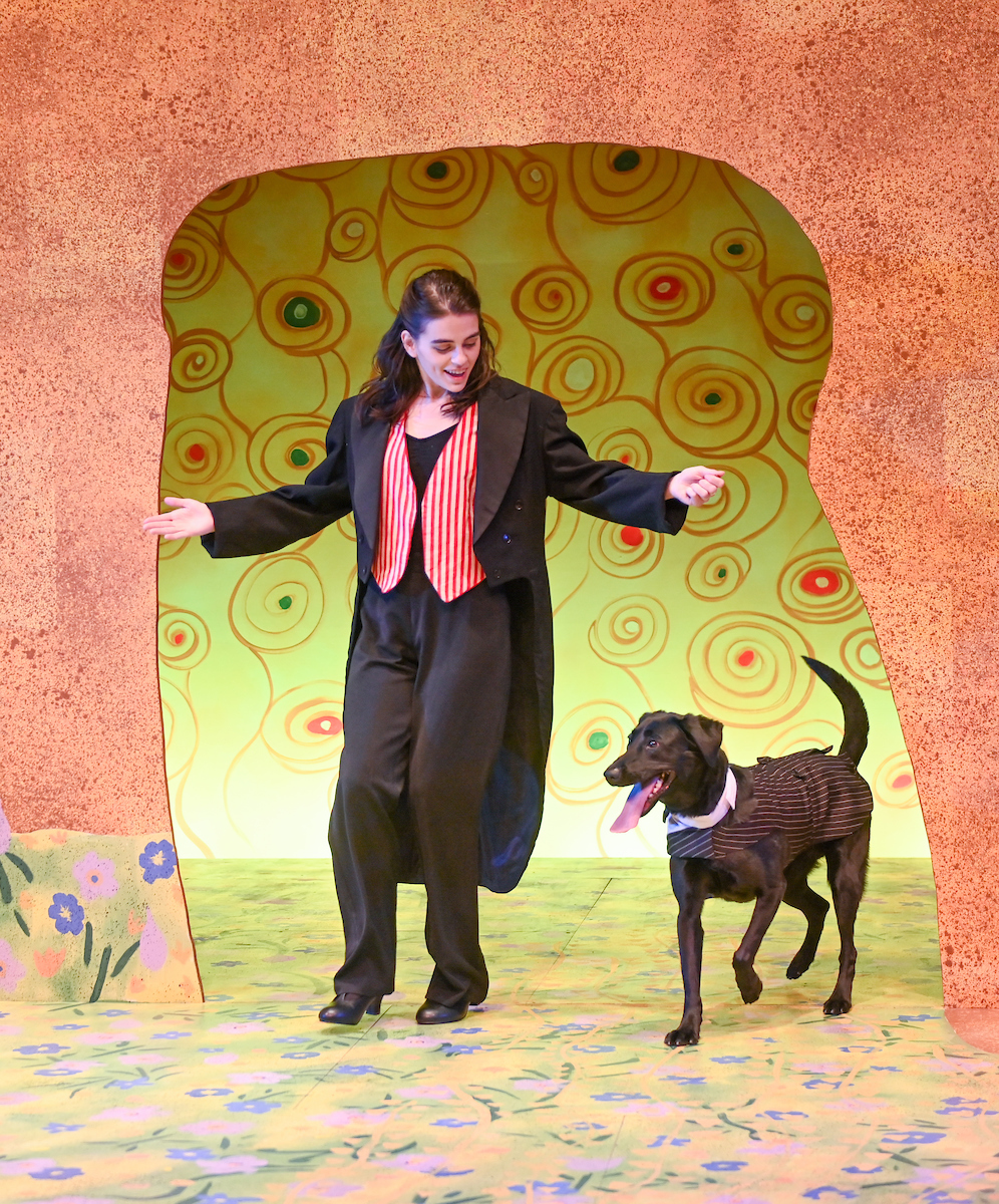 Gwynne Jones runs through a scene with Deka the dog in the Fine Arts Center. The Theatre Division produced an online production of "The Vaudevillians" due to safety concerns caused by COVID.
