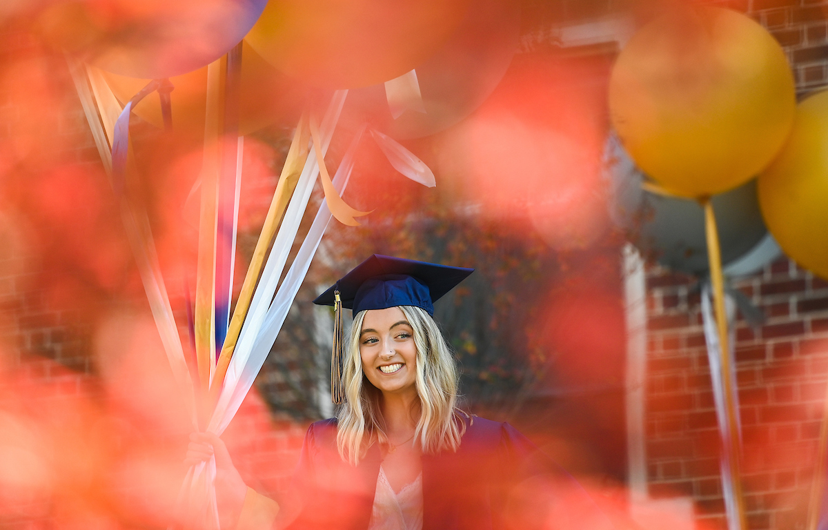 Psychology major Caitlin Williams poses for senior photos.