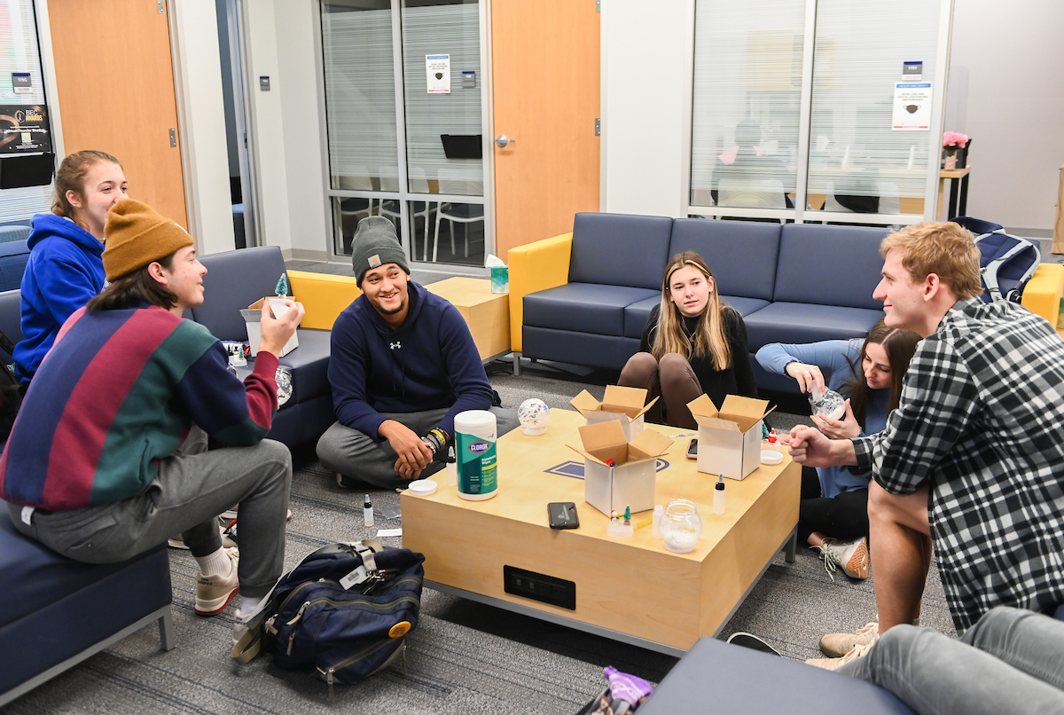 Students make snow globes during Winter Welcome.
