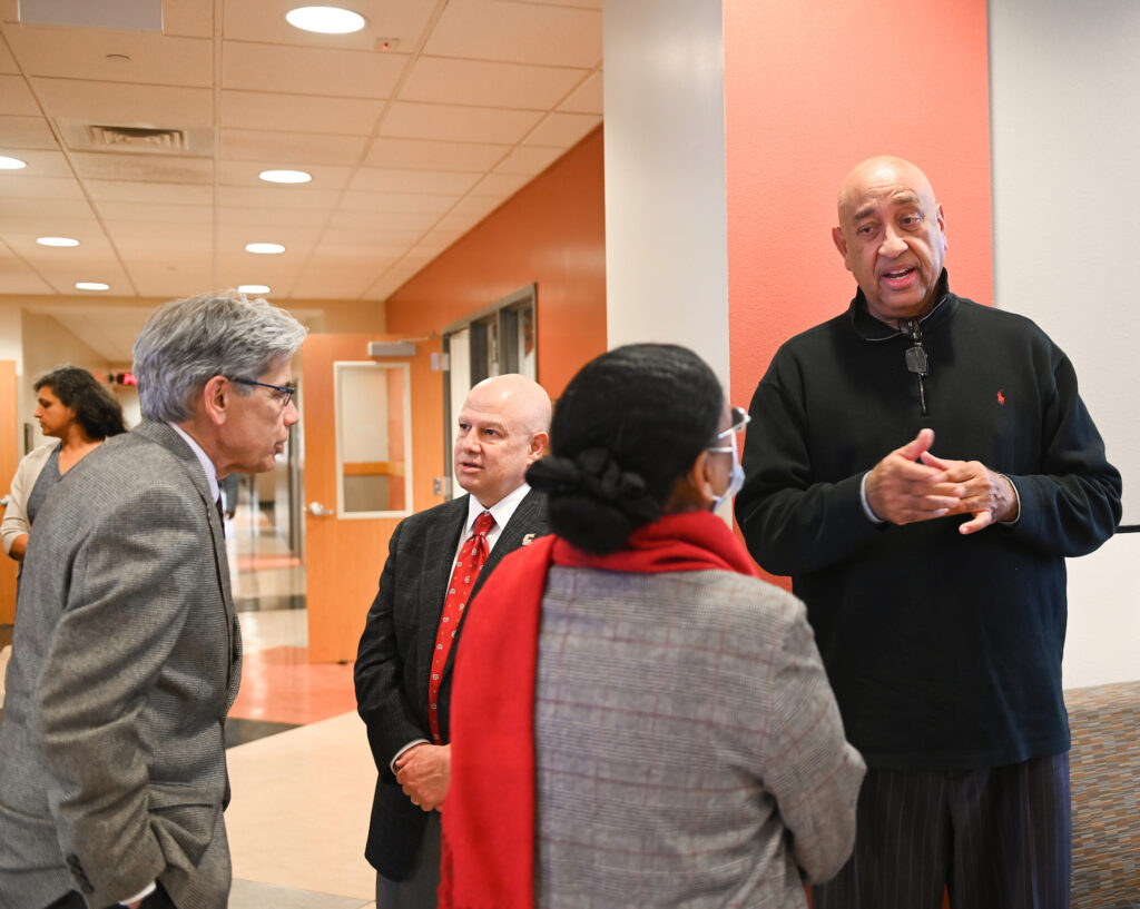 Albert Woodard, right, at a December 2021 celebration of a gift from Truist in support of the College of Engineering and Computer Science’s internship program. Photo by Angela Foster.