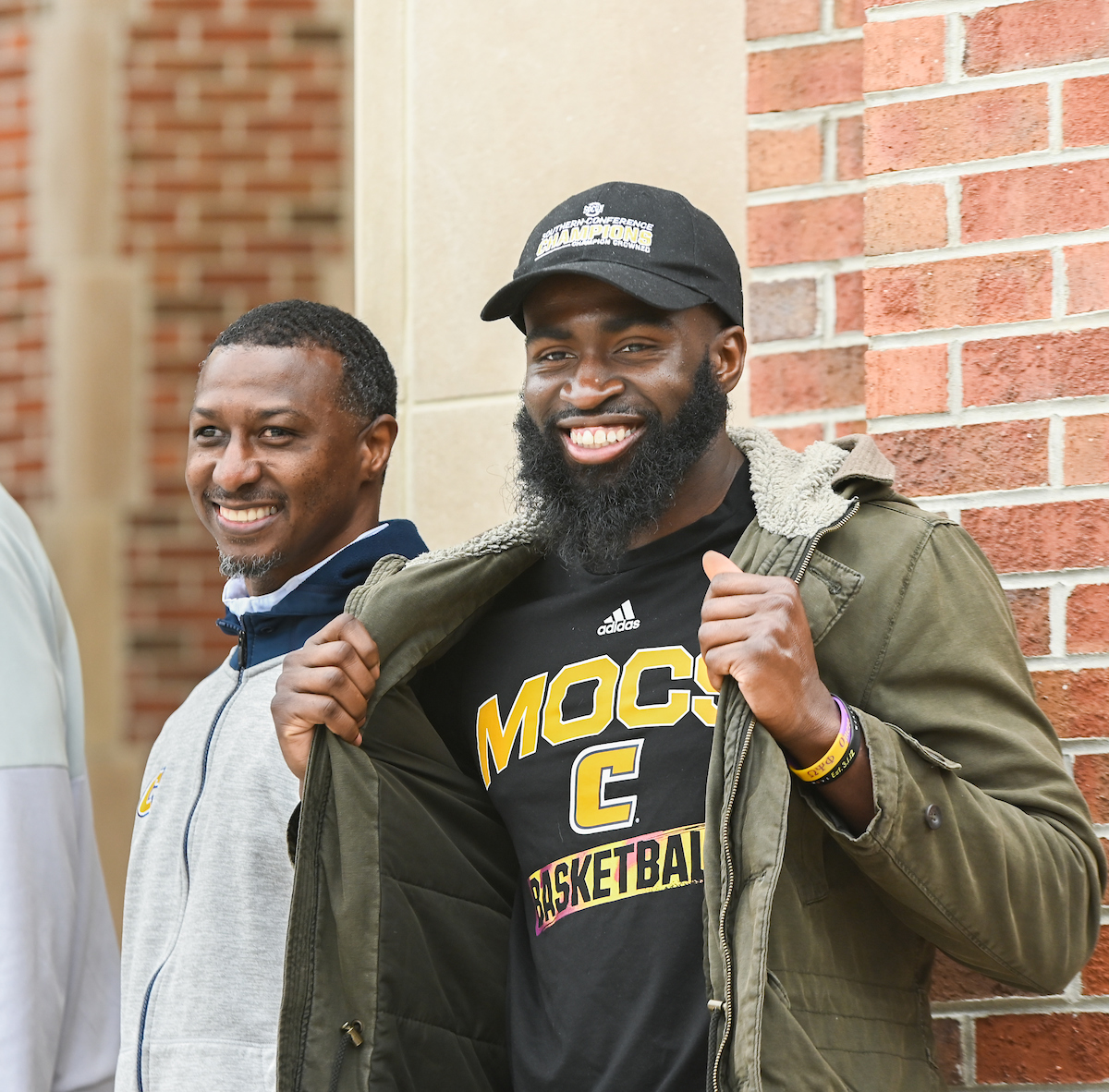 David Jean-Baptiste during celebration for 2022 basketball team.