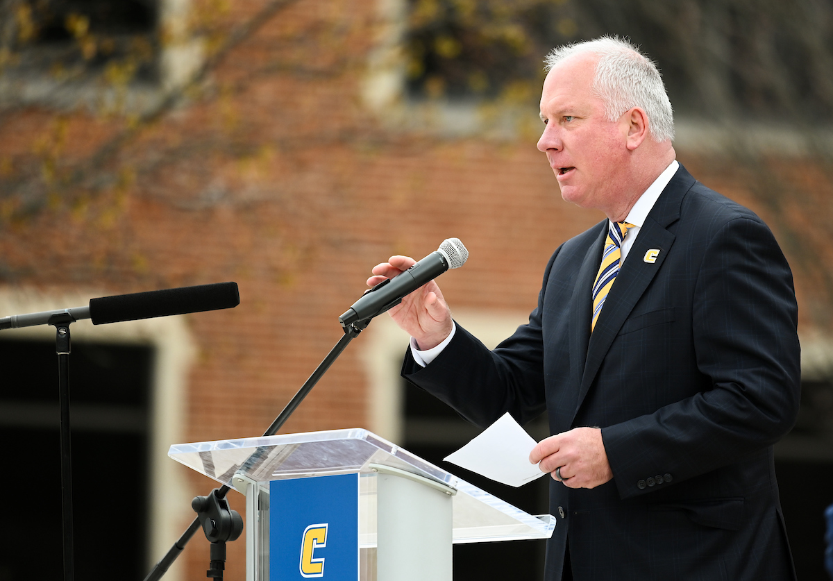 Director of Athletics Mark Wharton during celebration on Chamberlain Field for 2022 men's basketball team.