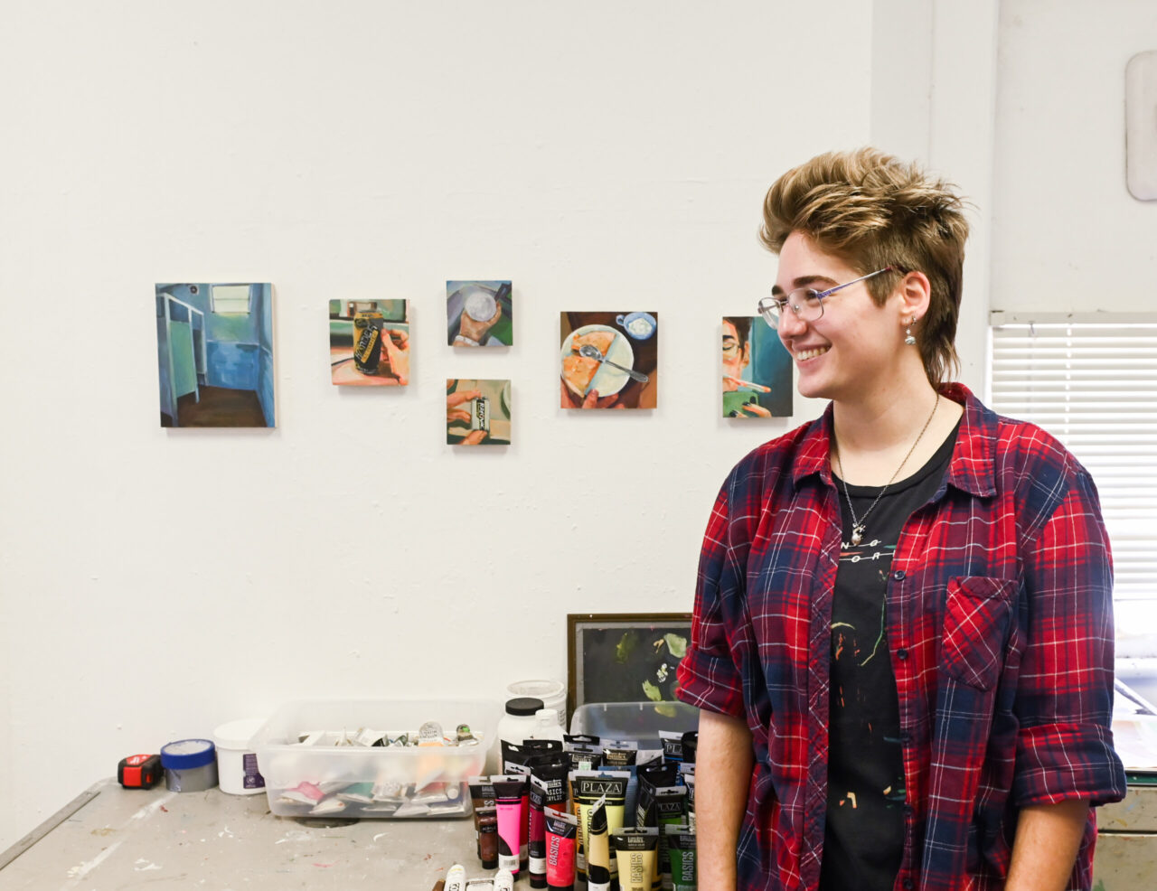 Senior art students display their work during the Painting and Drawing Open Studios event Thursday, April 29, 2022 in the carriage house art studios.