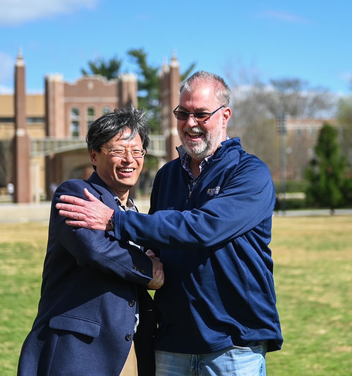 Dean of Engineering Daniel Pack and Dean of Business Robert Dooley