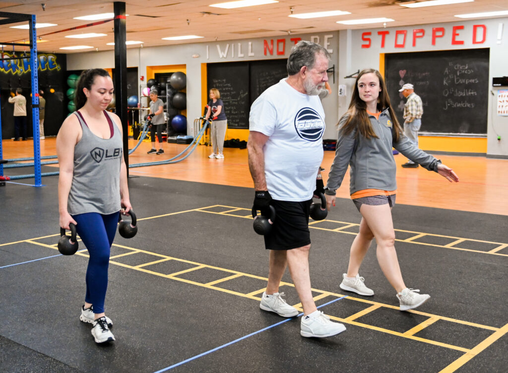 UTC occupational therapy clinical doctoral student Grace Sanford, right, spent her spring semester capstone project working with Parkinson’s fighters at Rock Steady Boxing Chattanooga. All photos by Angela Foster.