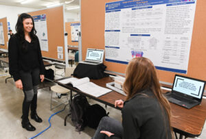 Arielle Scalioni, left, participated in the 2022 Engineering Technology Symposium at the Chattanooga Public Library.