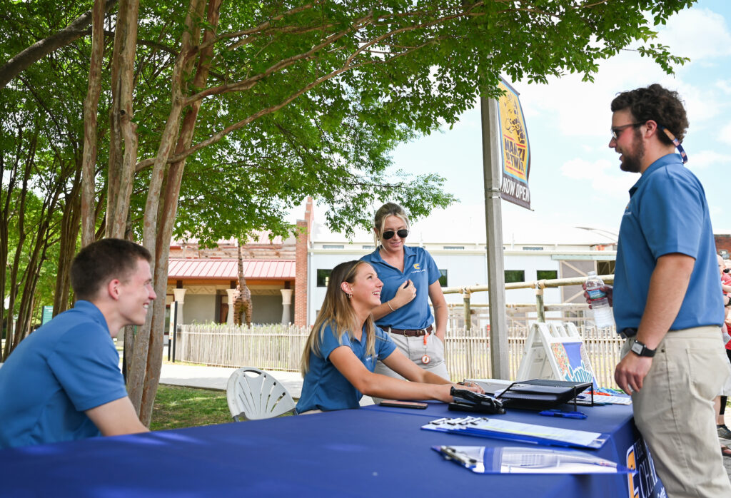 UTC Sport, Outdoor Recreation and Tourism majors Tyler Fly, left, Annaka Hall, Shelby Rector and Luke Beaty are working on a “Chattanooga Zoo Impact Analysis” this summer. Photo by Angela Foster.