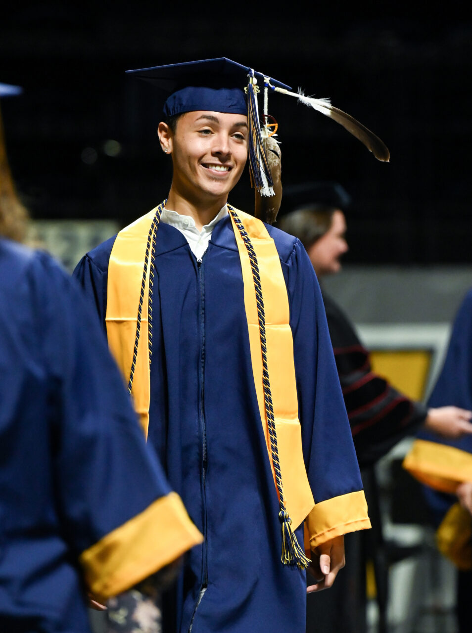 Graduate River Carroll walks across the stage during the first of four undergraduate graduation ceremonies Saturday, May 7, 2022 in McKenzie Arena at the University of Tennessee at Chattanooga.Undergrad graduation, ceremony 1 of 4, Friday, May 6, 2022 in McKenzie Arena.