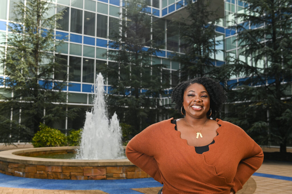 Jermillya Farris stands Wednesday, Feb. 23, 2022 outside of BlueCross BlueShield on Cameron Hill.