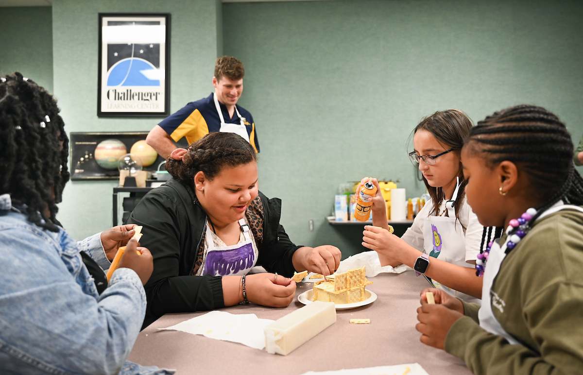 Building with saltine crackers and spray-can cheese
