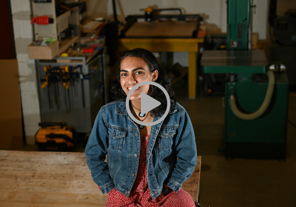 Sam de Armas sits, Tuesday, March 8, 2022 in the wood shop of the Fine Arts Building.