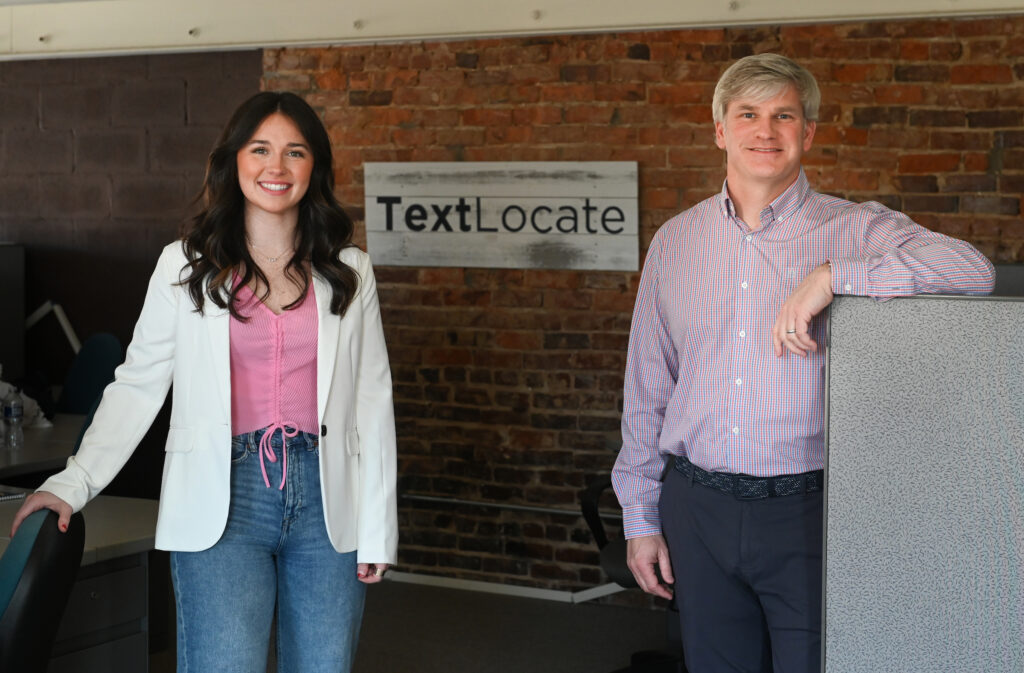 Leighanna Martin and Ryan Rogers stand Wednesday, Feb. 9, 2022 near Text Locate.
