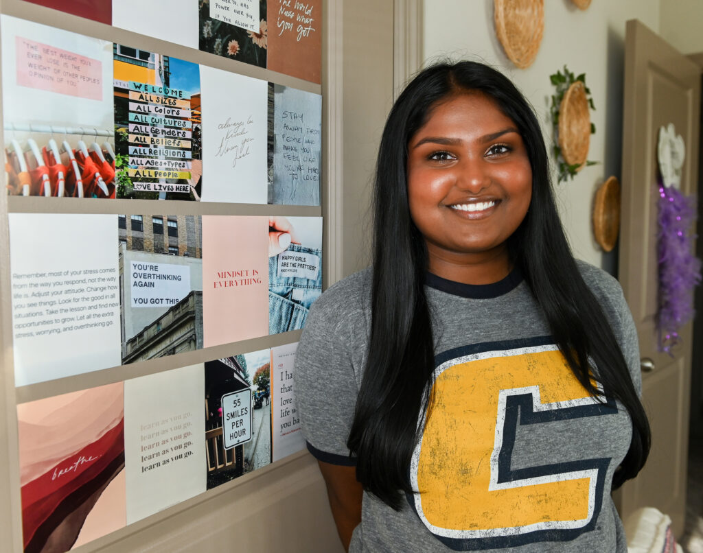 Varsha Kommireddi sits Wednesday, Feb. 23, 2022 in her apartment.
