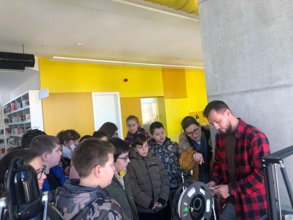 Freeman Broadwell, far right, a 2016 UTC graduate, started a STEM program for students from middle school to university-level in Albania. He is shown here with some of the STEM students.