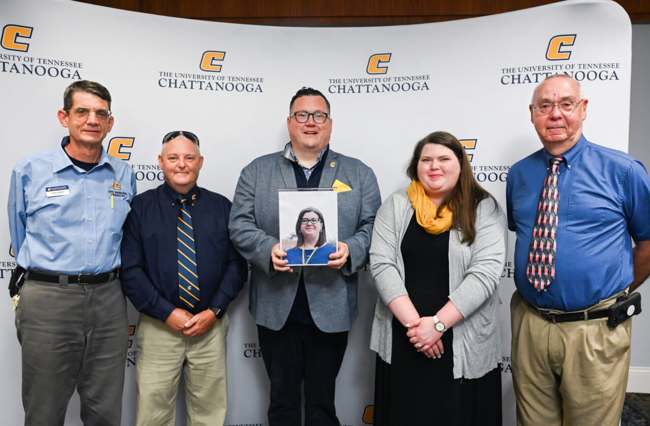 Blue Ribbon Award winners, from left, John Johnson, Leslie Ellis, Jason Harville, holding photo of Blue Ribbon winner Nora Ketron, Tish Hubbard and Bill Floyd were honored Tuesday, Aug. 30, 2022, during a luncheon in the University Center. Photo by Angela Foster.
