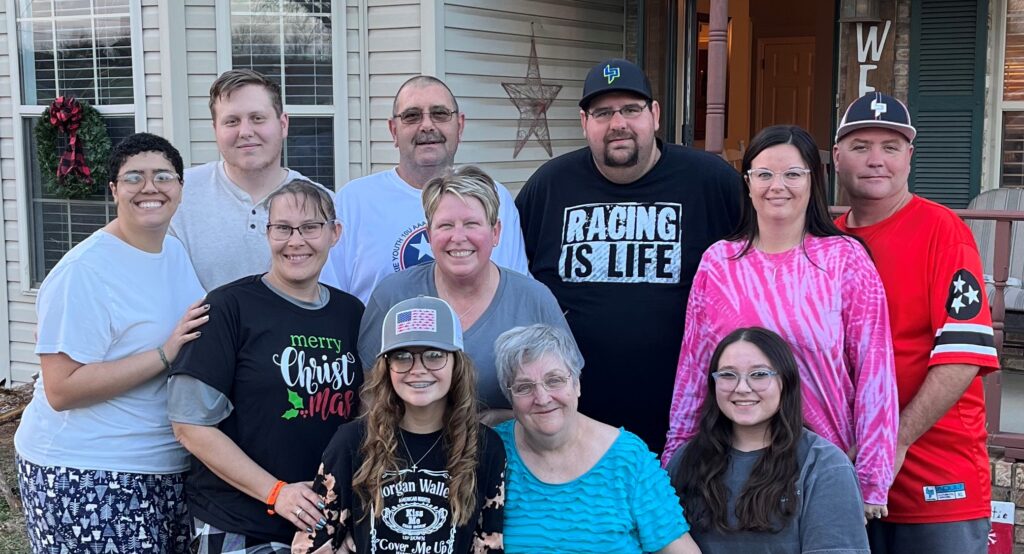 Katherine Crutchfield’s family photo. Back row, left to right: Scott Tuskey (her boyfriend), John Brogdon Jr. (her uncle), Justin Brogdon (middle brother), John Brogdon III (oldest brother). Middle row: Crutchfield, Amanda Marshall (Justin’s wife), Teresa Brogdon (her aunt), Heather Ferrell (John III’s wife). Bottom row: Chasity Brogdon (John III and Heather’s daughter), Francis Christianson (Teresa’s mom), Kendra Brogdon (Justin and Amanda’s daughter). Photo courtesy of Katherine Crutchfield.