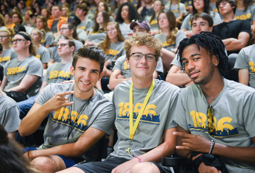 Students in the McKenzie Arena crowd at Convocation