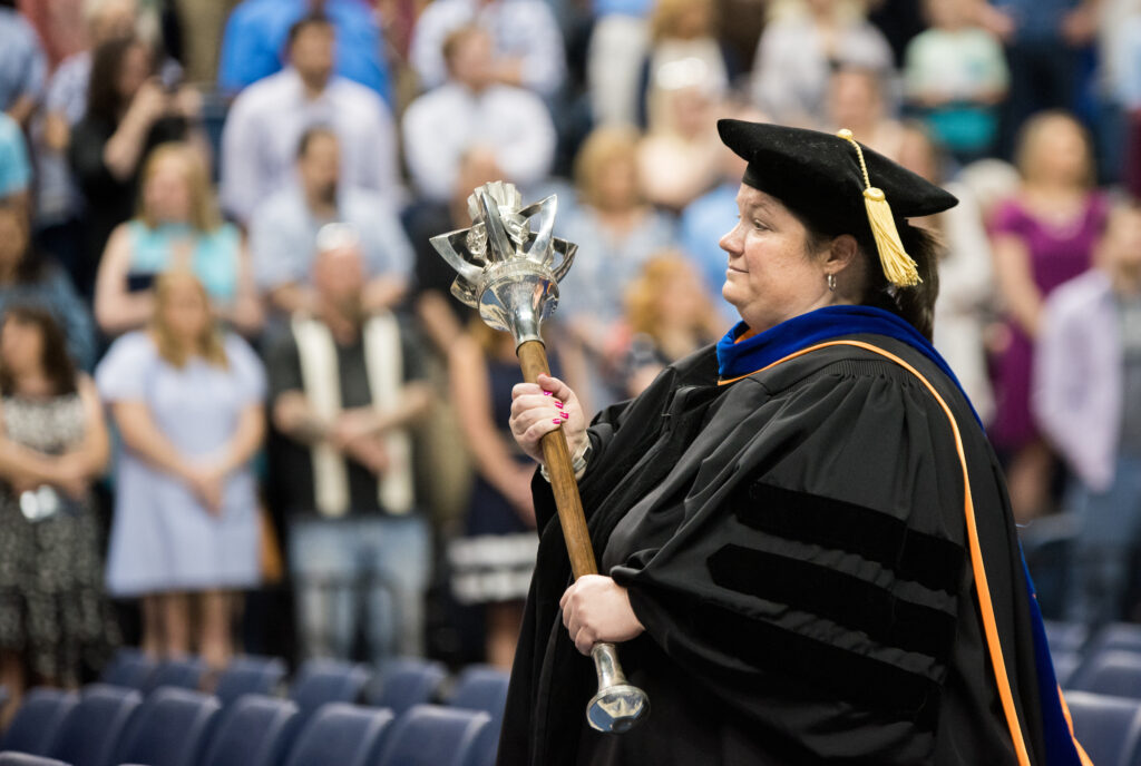 As faculty senate president during the 2017-2018 academic year, Gretchen Potts served as mace bearer during UTC commencement ceremonies.