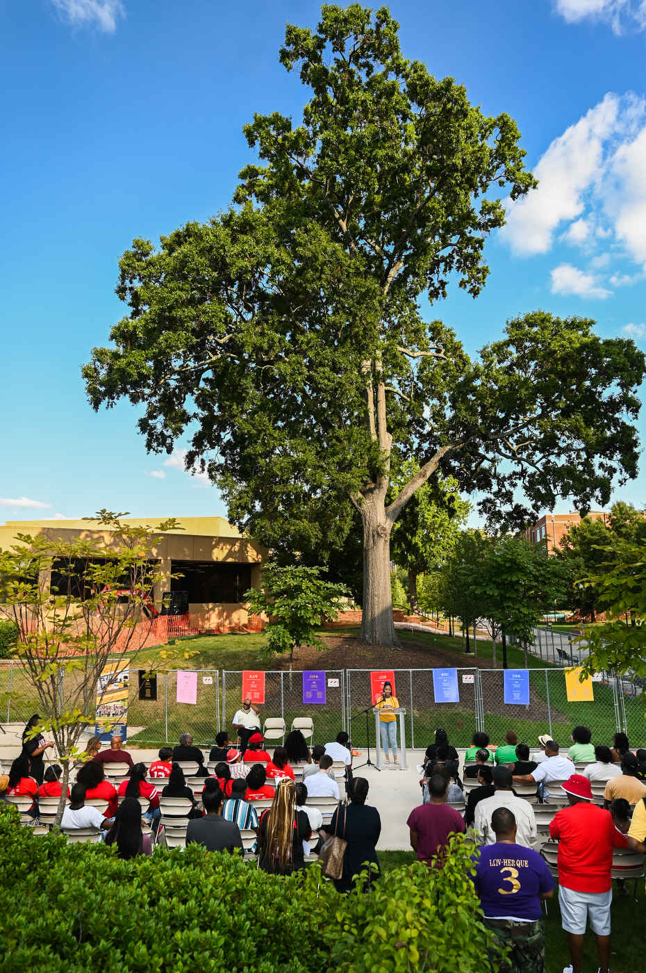 People gather for the update on the Divine Nine construction project Friday, Sept. 16, 2022 near the construction site.
