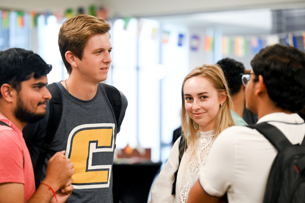 Arsen Martyshchuk, left, and Nina Klimenkova began immersing themselves in the UTC culture at the International Student Welcome during Welcome Week.