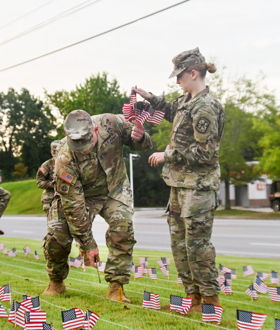 University of Tennessee at Chattanooga ROTC members place 2000 flags in front of Lane Funeral Home on Ashland Terrace, Wednesday, Sept. 7, 2022 in honor of 9/11.
