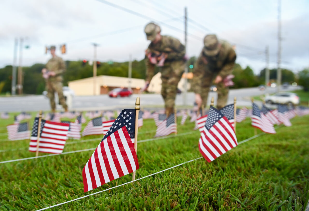 University of Tennessee at Chattanooga ROTC members place 2000 flags in front of Lane Funeral Home on Ashland Terrace, Wednesday, Sept. 7, 2022 in honor of 9/11.