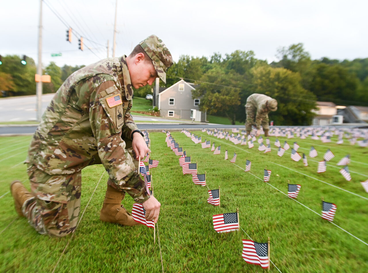 University of Tennessee at Chattanooga ROTC members place 2000 flags in front of Lane Funeral Home on Ashland Terrace, Wednesday, Sept. 7, 2022 in honor of 9/11.