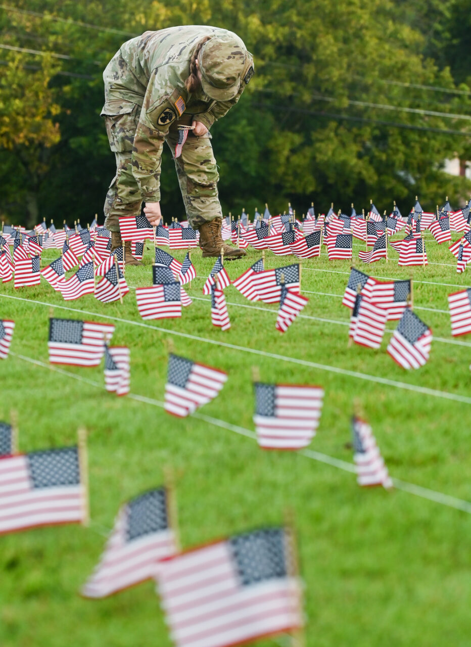 University of Tennessee at Chattanooga ROTC members place 2000 flags in front of Lane Funeral Home on Ashland Terrace, Wednesday, Sept. 7, 2022 in honor of 9/11.