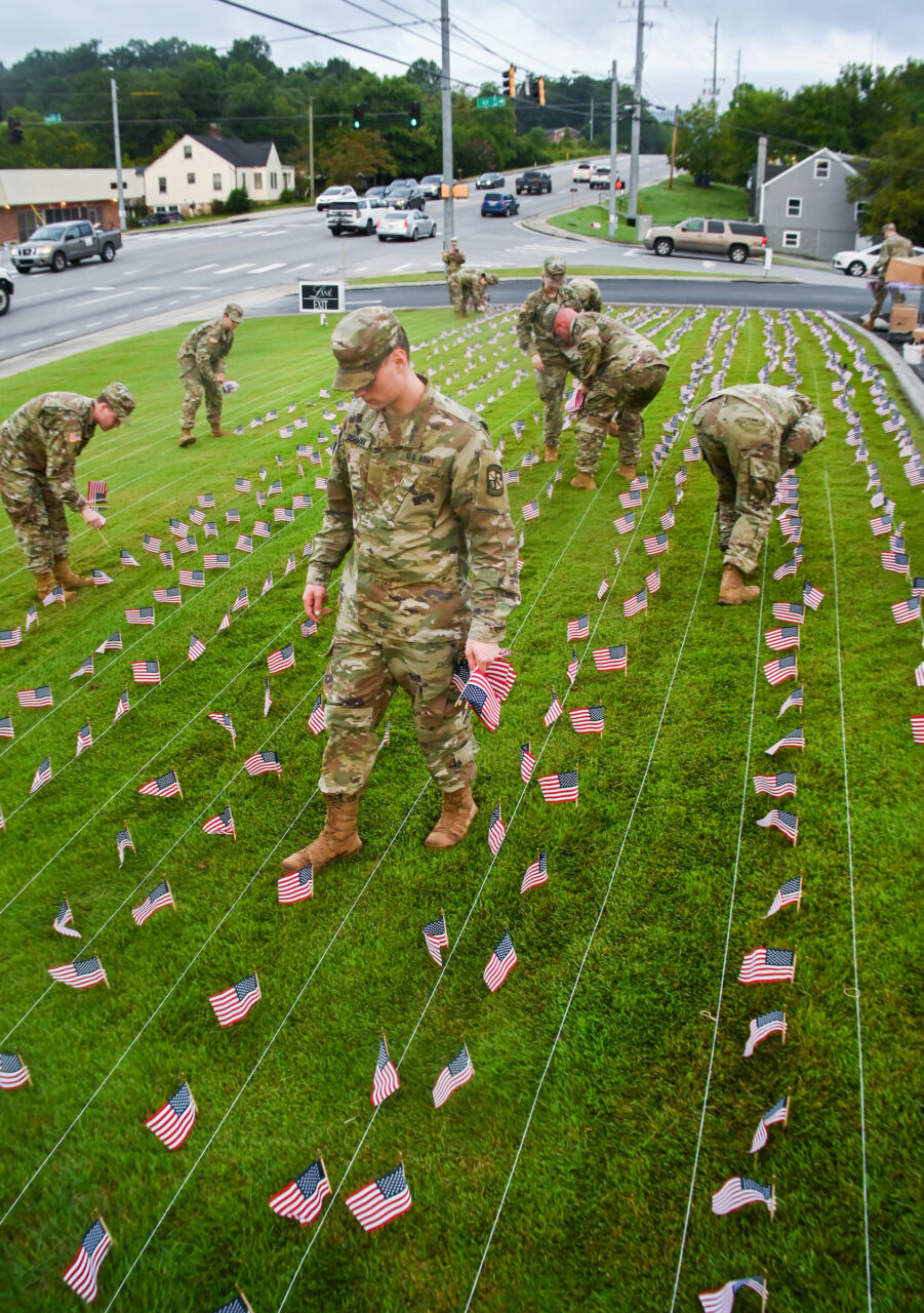 University of Tennessee at Chattanooga ROTC members place 2000 flags in front of Lane Funeral Home on Ashland Terrace, Wednesday, Sept. 7, 2022 in honor of 9/11.