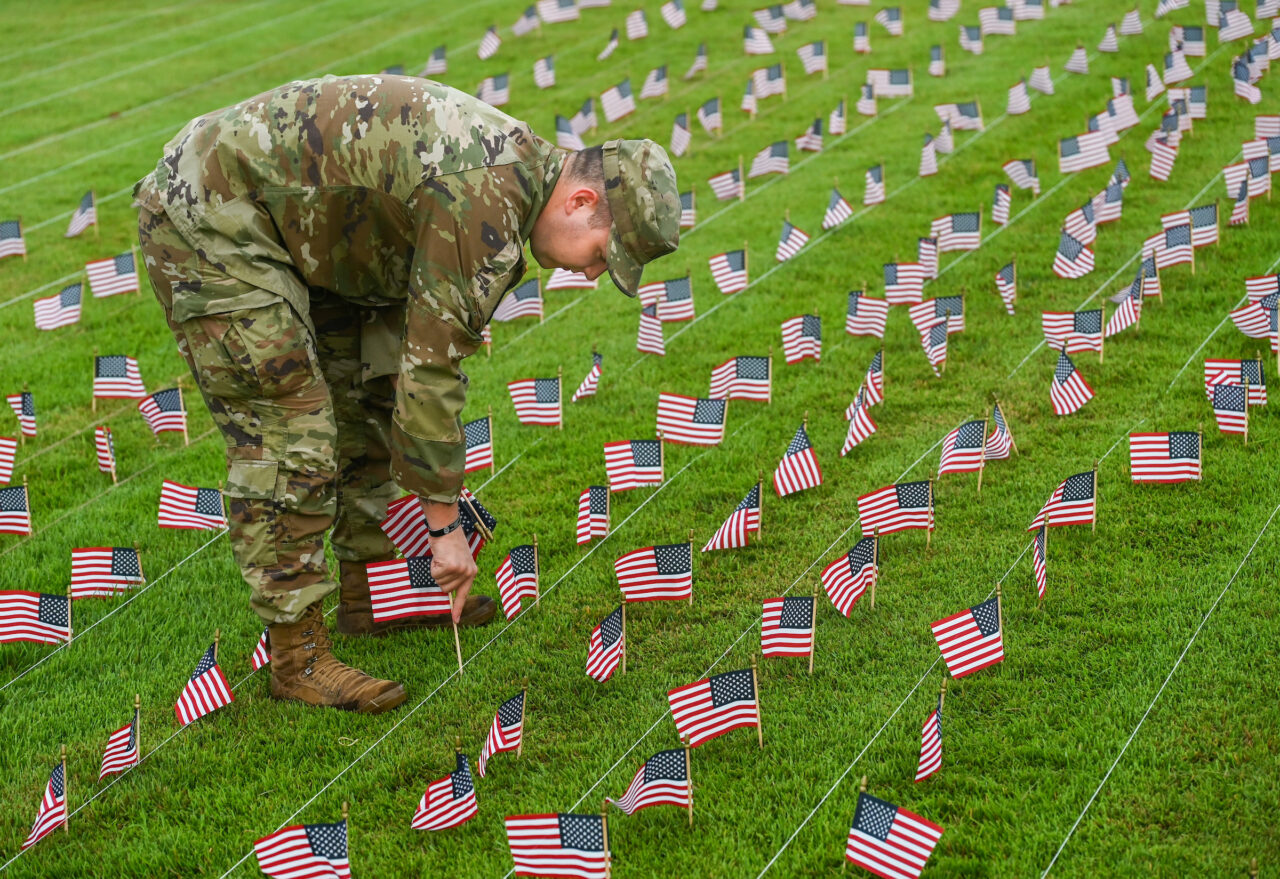 University of Tennessee at Chattanooga ROTC members place 2000 flags in front of Lane Funeral Home on Ashland Terrace, Wednesday, Sept. 7, 2022 in honor of 9/11.