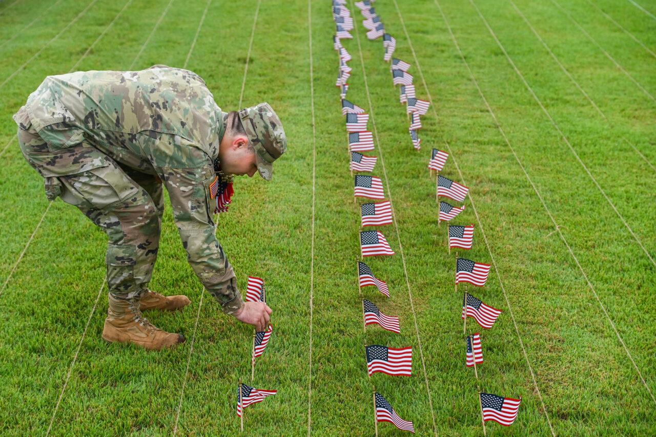 University of Tennessee at Chattanooga ROTC members place 2000 flags in front of Lane Funeral Home on Ashland Terrace, Wednesday, Sept. 7, 2022 in honor of 9/11.
