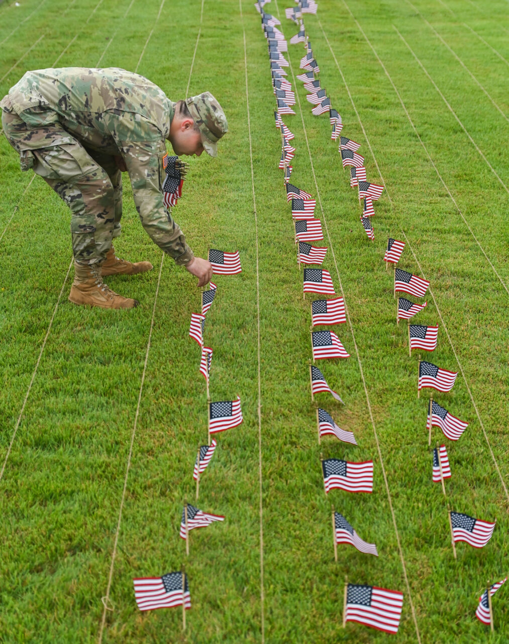 University of Tennessee at Chattanooga ROTC members place 2000 flags in front of Lane Funeral Home on Ashland Terrace, Wednesday, Sept. 7, 2022 in honor of 9/11.
