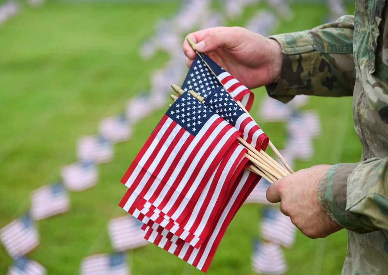 University of Tennessee at Chattanooga ROTC members place 2000 flags in front of Lane Funeral Home on Ashland Terrace, Wednesday, Sept. 7, 2022 in honor of 9/11.