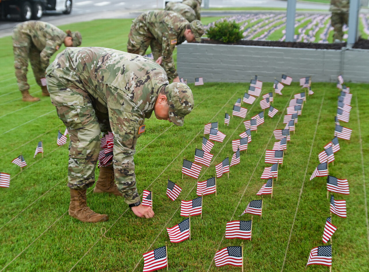 University of Tennessee at Chattanooga ROTC members place 2000 flags in front of Lane Funeral Home on Ashland Terrace, Wednesday, Sept. 7, 2022 in honor of 9/11.