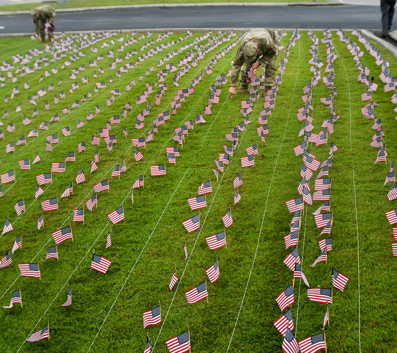 University of Tennessee at Chattanooga ROTC members place 2000 flags in front of Lane Funeral Home on Ashland Terrace, Wednesday, Sept. 7, 2022 in honor of 9/11.