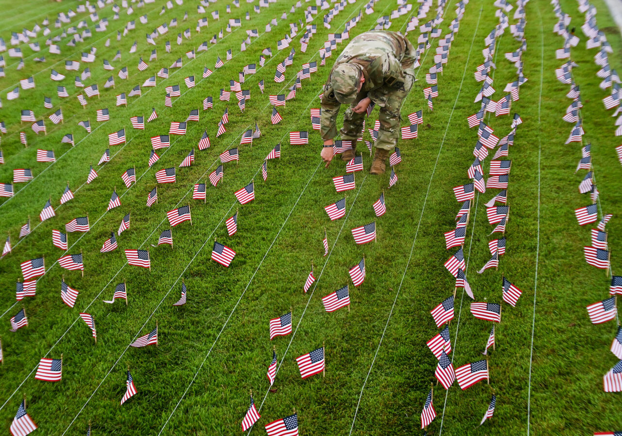 University of Tennessee at Chattanooga ROTC members place 2000 flags in front of Lane Funeral Home on Ashland Terrace, Wednesday, Sept. 7, 2022 in honor of 9/11.