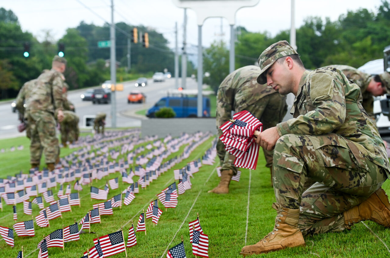 University of Tennessee at Chattanooga ROTC members place 2000 flags in front of Lane Funeral Home on Ashland Terrace, Wednesday, Sept. 7, 2022 in honor of 9/11.