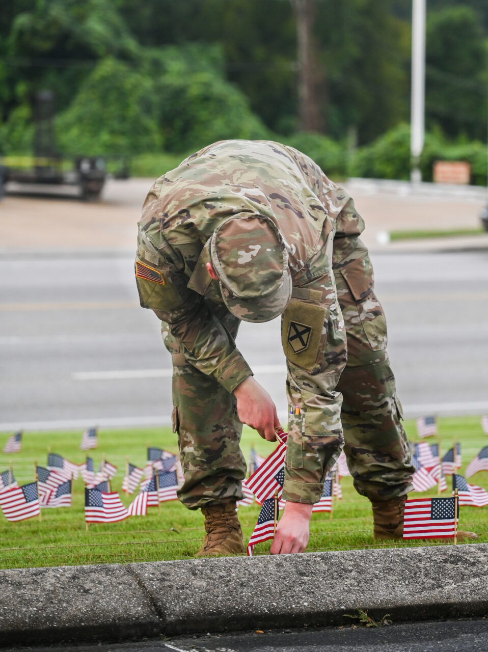 University of Tennessee at Chattanooga ROTC members place 2000 flags in front of Lane Funeral Home on Ashland Terrace, Wednesday, Sept. 7, 2022 in honor of 9/11.